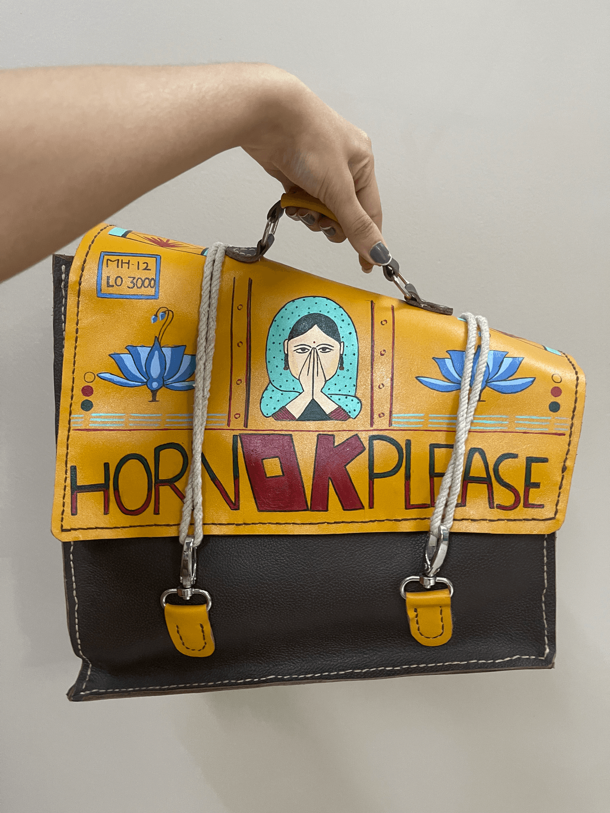 Hand-stitched leather bag, hand-painted with a Horn OK Please design
